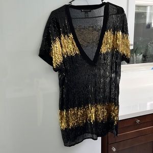 Black and gold sequin top size large. Great condition. Perfect for a Saints fan!